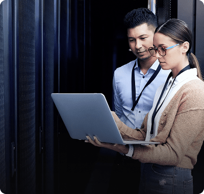 Data center professionals with laptop